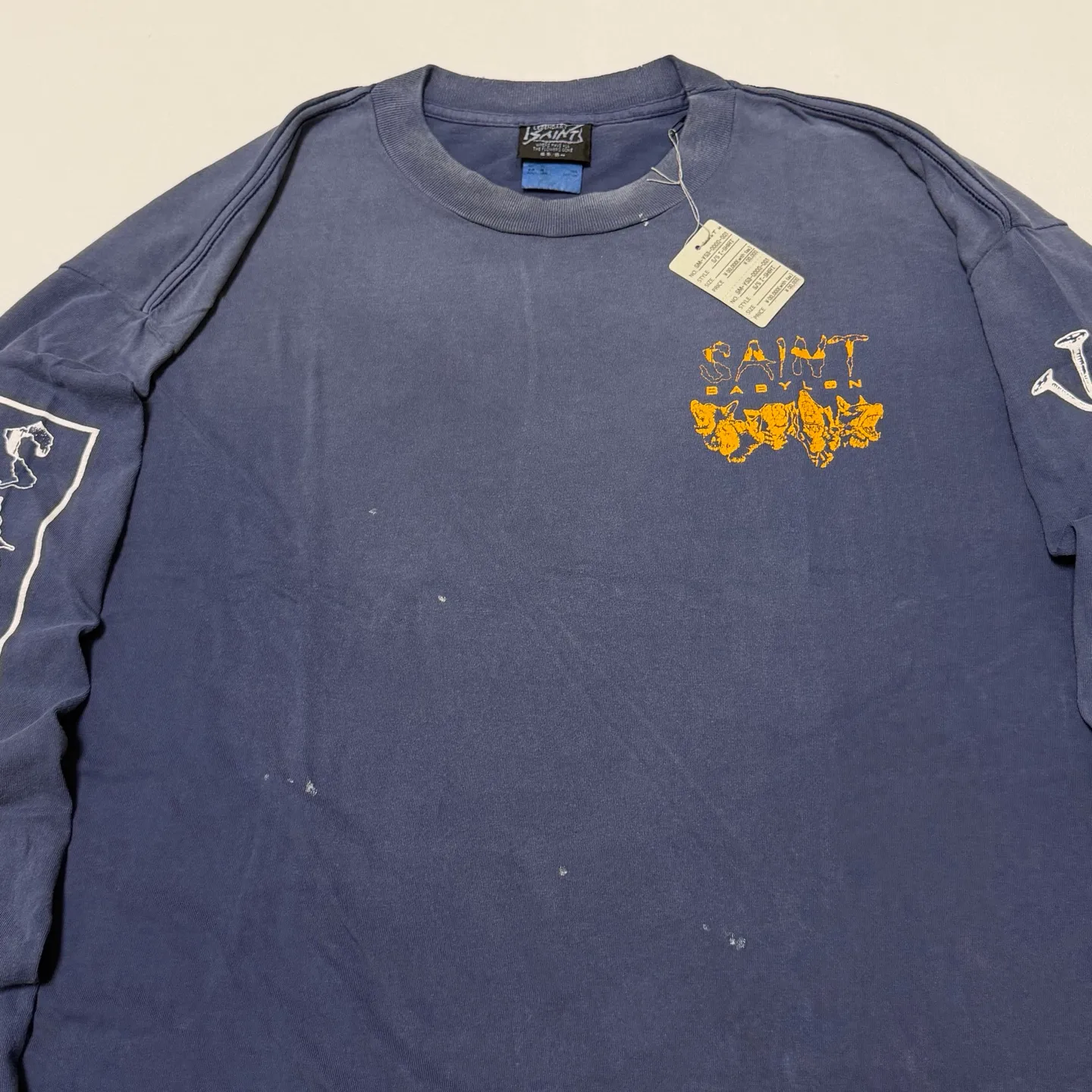 SAINT Mxxxxxx × BABYLON BBLN_LS TEE/SAINT BABYLON/NVY/BABYLON co-branded style Wolf head SAINT/nail distressed long sleeves Washed blue S-XL Completely matched Tube weaving fabric without side seams Garment dyeing Maliu water faded distressing Simulated sun fading treatment Natural fading Handmade holes and frayed Ink splashing treatment Correct main mark/wash mark/little angel anti-counterfeiting mark